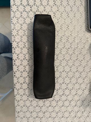 Piastra capelli Remington con borsina nera