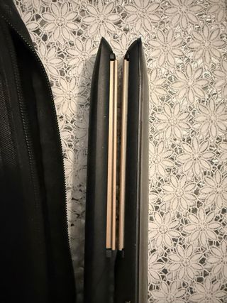 Piastra capelli Remington con borsina nera