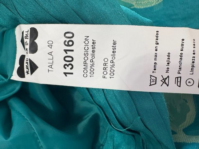 Vestido palabra de honor con torera verde