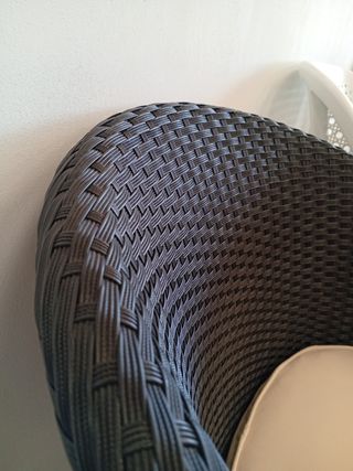 Sedia da esterno in rattan sintetico nero