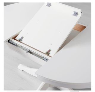 Mesa redonda extensible blanca