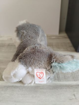 Peluche perro husky ojos grandes