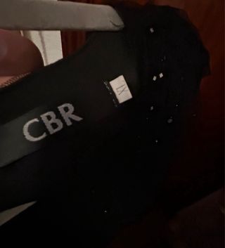 Mono de fiesta negro con brillos