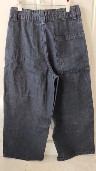 Pantalón vaquero ancho con cinturón