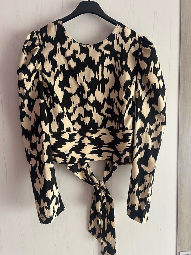 Blusa estampada manga larga