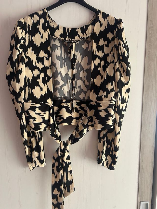 Blusa estampada manga larga