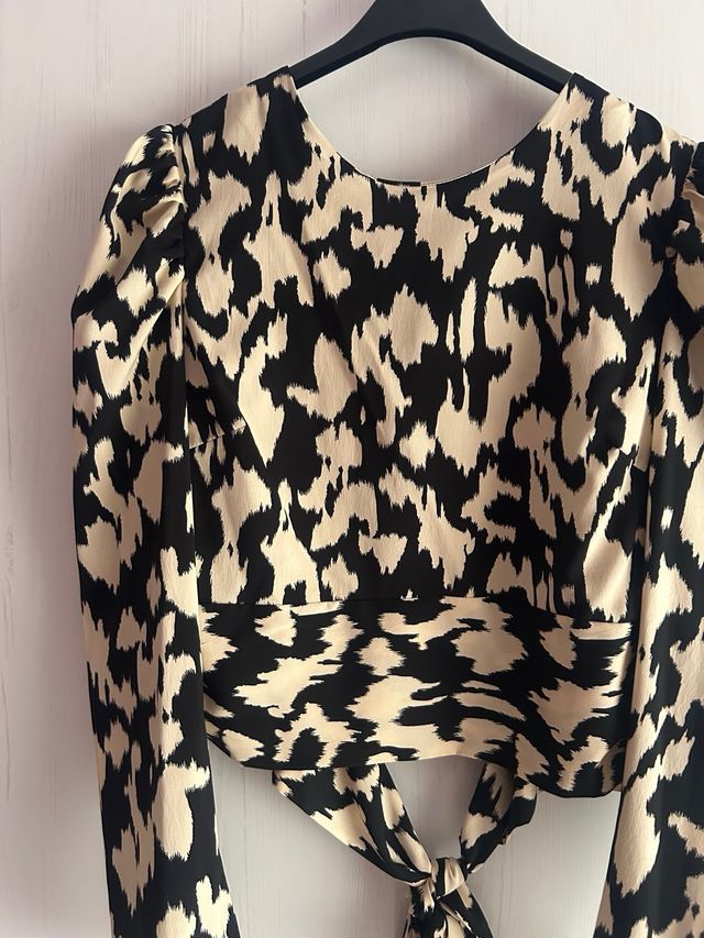 Blusa estampada manga larga