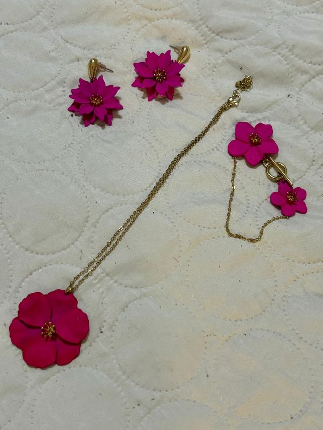 Conjunto de flores oro y rosa