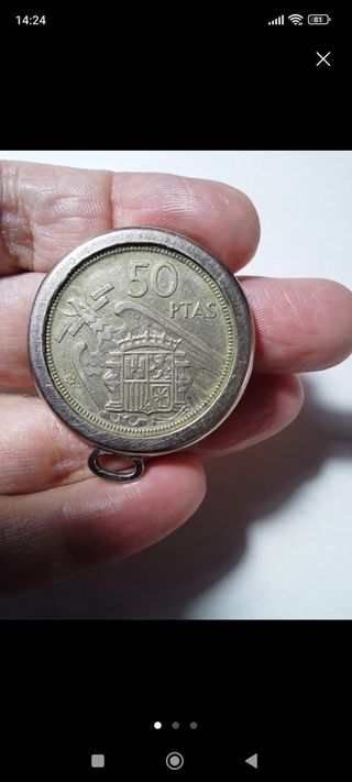 Medalla 50 Pesetas 1957
Estrella 58 