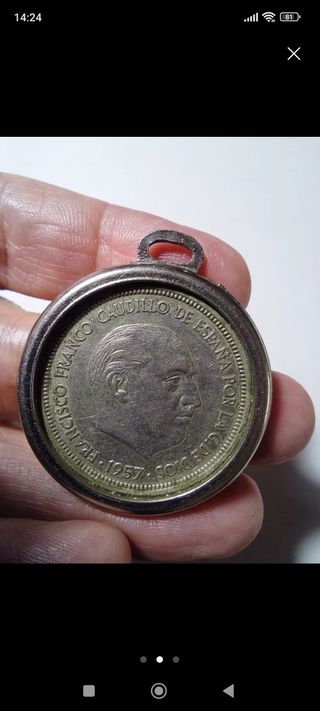 Medalla 50 Pesetas 1957
Estrella 58 