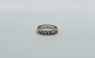 ANILLO  CON 7 DIAMANTES ORO 18K