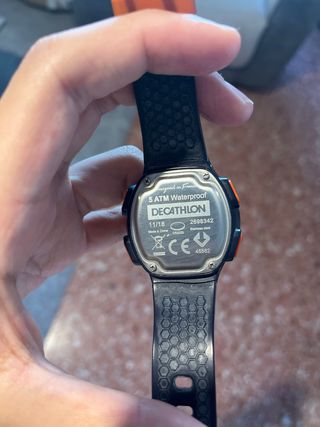 Reloj deportivo Kalenji negro y naranja