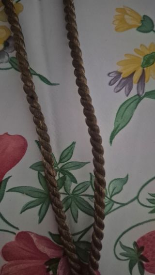 Rosario con cruz de madera y borla