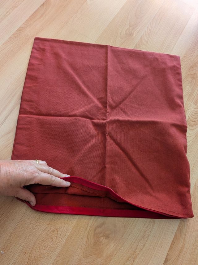 Fundas cojines naranja y granate