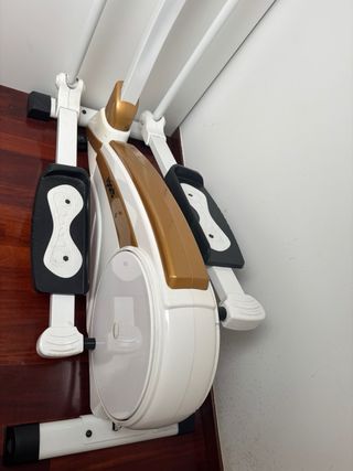 Bicicleta Elíptica Sportplus blanca y dorada