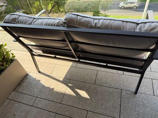 Sillón de terraza gris.