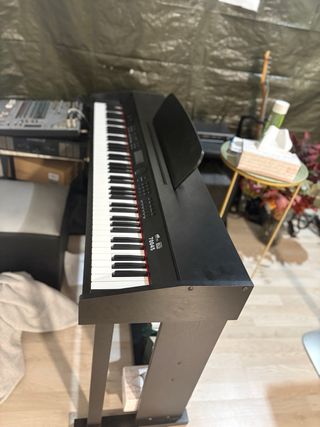 Piano de cola electrico