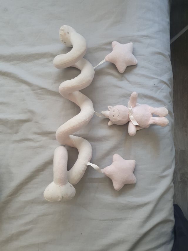 Juguete espiral para carrito de bebé