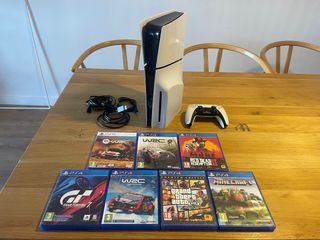 Ps5 Slim con lector + seguro game 4 años+ 7 juegos