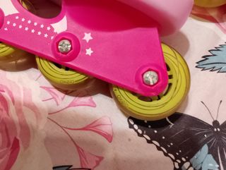 Roller per bambina Oxelo rosa + tre protezioni