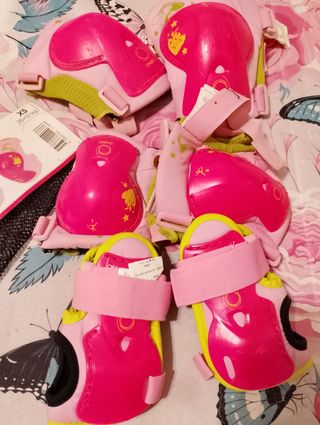 Roller per bambina Oxelo rosa + tre protezioni