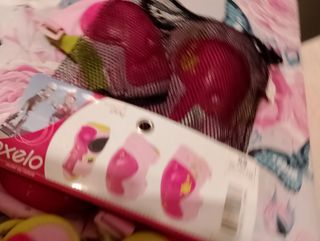 Roller per bambina Oxelo rosa + tre protezioni