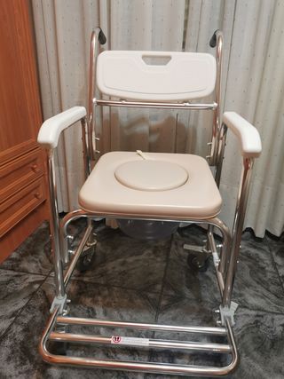 Silla de ruedas de interior de vivienda