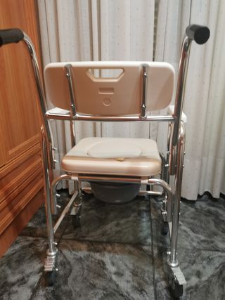 Silla de ruedas de interior de vivienda