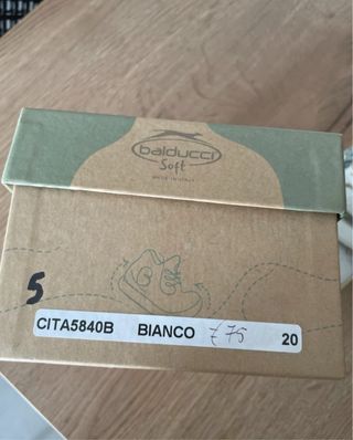 Scarpe neonata bianche