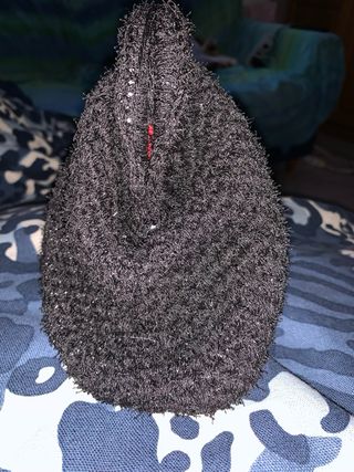 Clutch nera effetto peloso e lurex