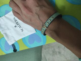 Pulsera Scalpers Mujer celeste y Dorada