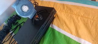 PlayStation 2 con 3 mandos