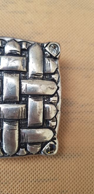 Fibbia cintura metallo effetto intrecciato