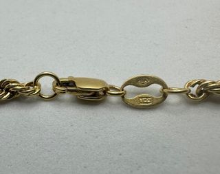 Cadena Salomónica de oro de 18k 12.66 g, 61 cm.