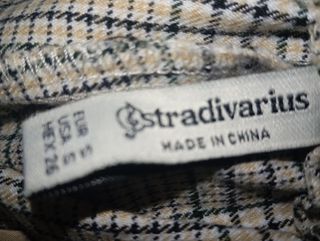 Pantalones de cuadros grises y blancos