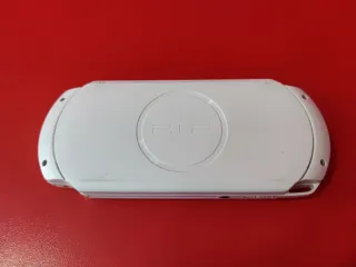 PSP E1004 Blanca + Cargador Compatible