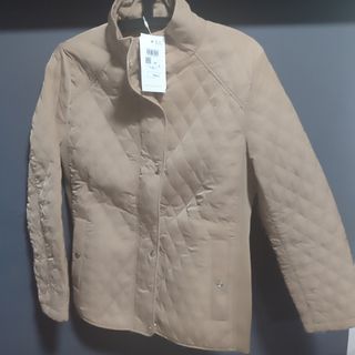 Chaqueta acolchada beige nueva con etiqueta