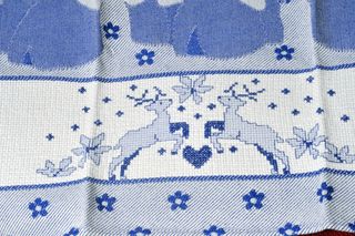 Asciugapiatti con mucche e renne