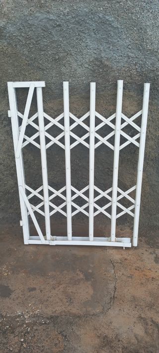 Verja de seguridad extensible