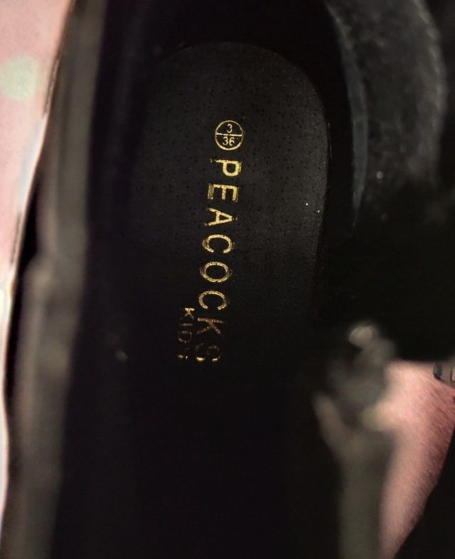 Botines negros con detalle de flecos