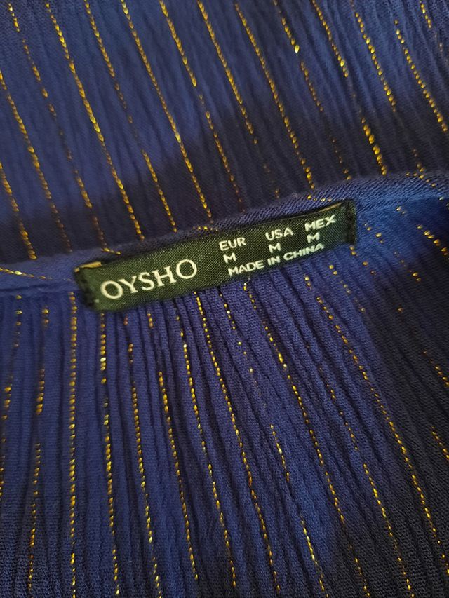 Vestido azul y dorado Oysho