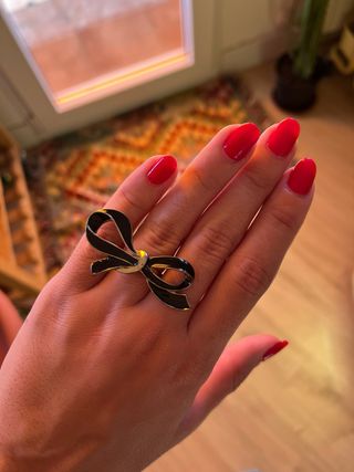 Anillo lazo negro y dorado