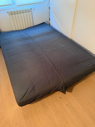 Sofá Cama Ikea Beddinge con funda azul oscuro.