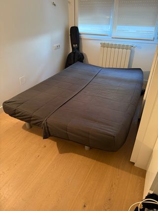 Sofá Cama Ikea Beddinge con funda azul oscuro.