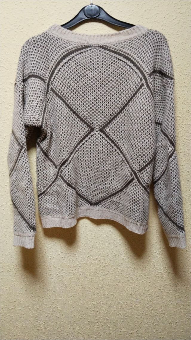 Jersey de punto con medidas.