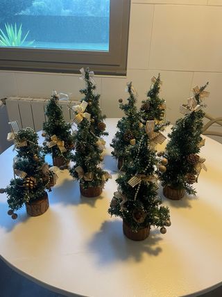 9 alberi di Natale in legno dorato