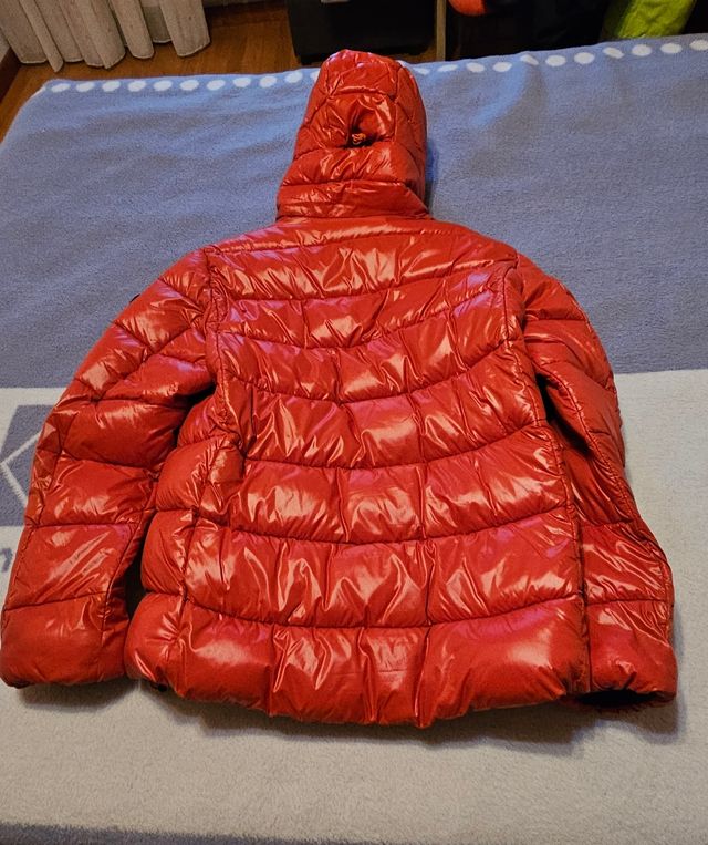 Save the Duck plumífero como naranja metalico