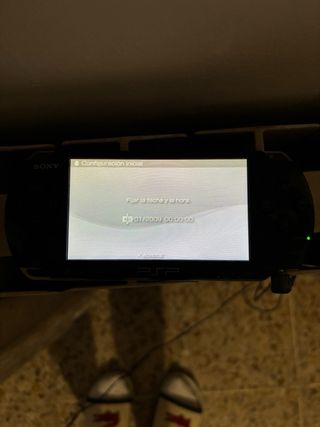 PSP nera con custodia e giochi