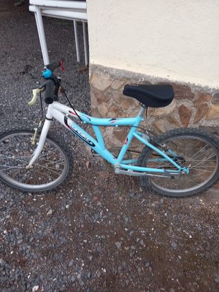 Bicicleta TOPBIKE azul y blanca.