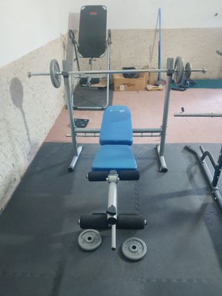 Conjunto de maquinas y mancuernas de gym